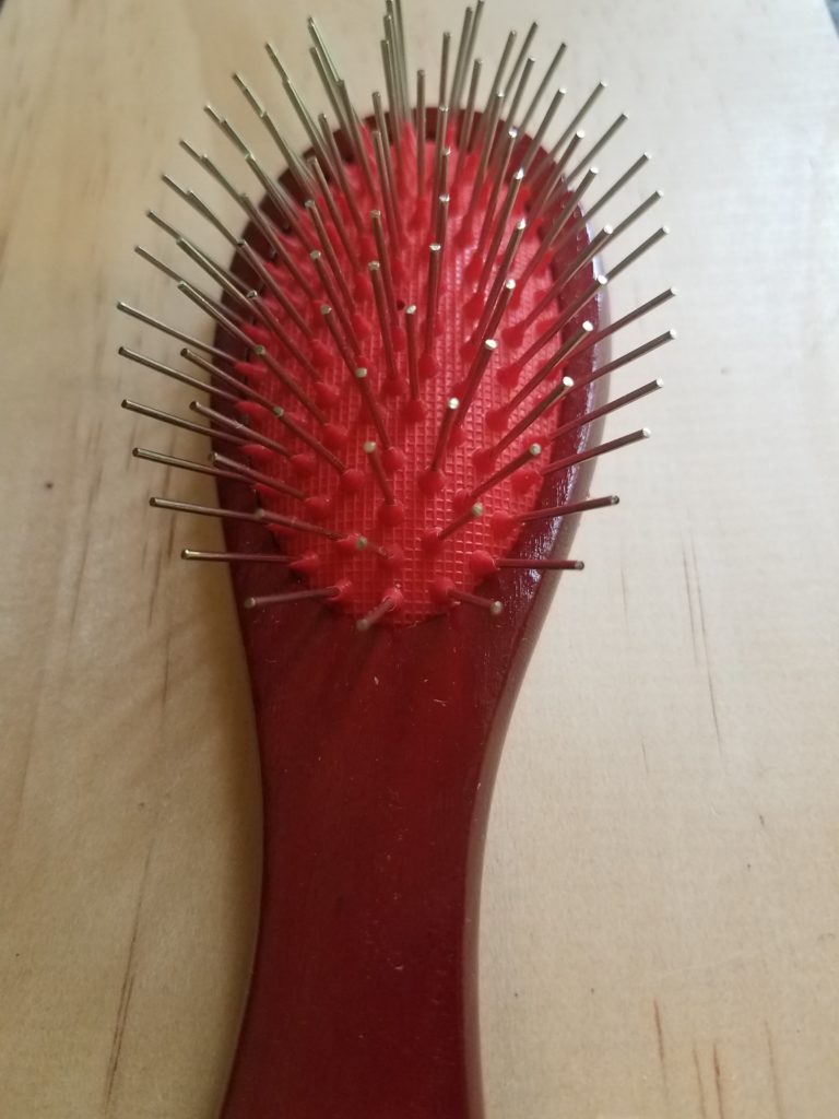 Stylers #486 Wire bristle Wig Brush-7 Row with rounded handle. Wood with cherry finish.